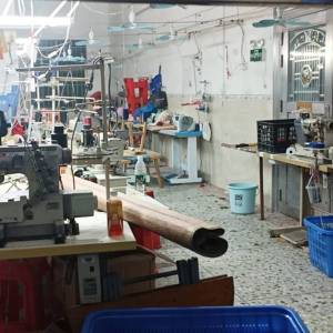 廉江市石颈镇来源制衣加工厂